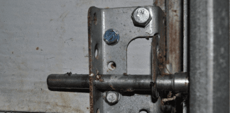 How Do Side Hinges Contribute To The Operation Of A Garage Door?
